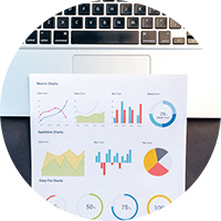 Workplace with notebook on black background